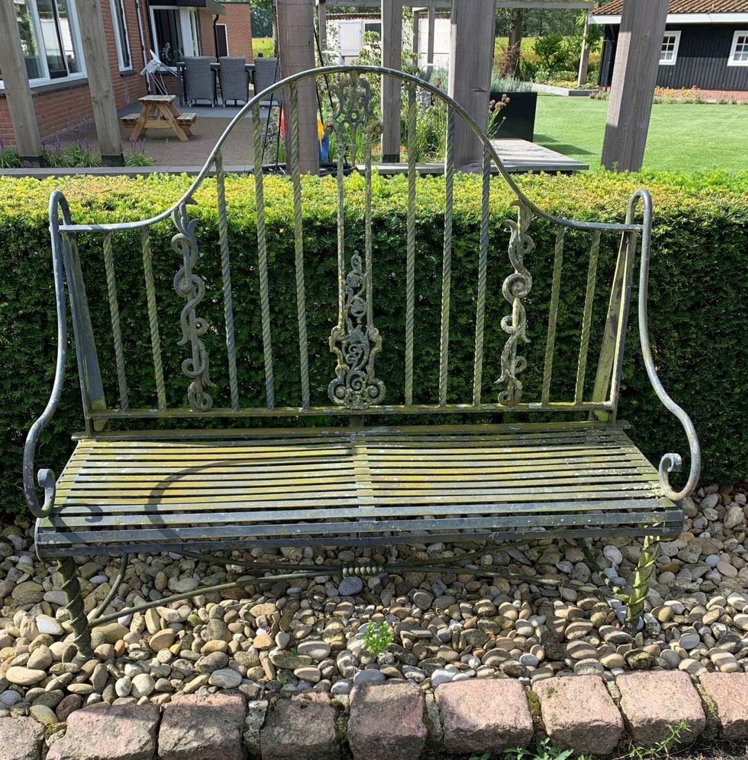 3-Person Wrought Iron Garden Bench, 1900: 3-person wrought iron garden bench with high backrest. Circa 1900. Dimensions: 140 x 153 x 60 cm. In good condition.