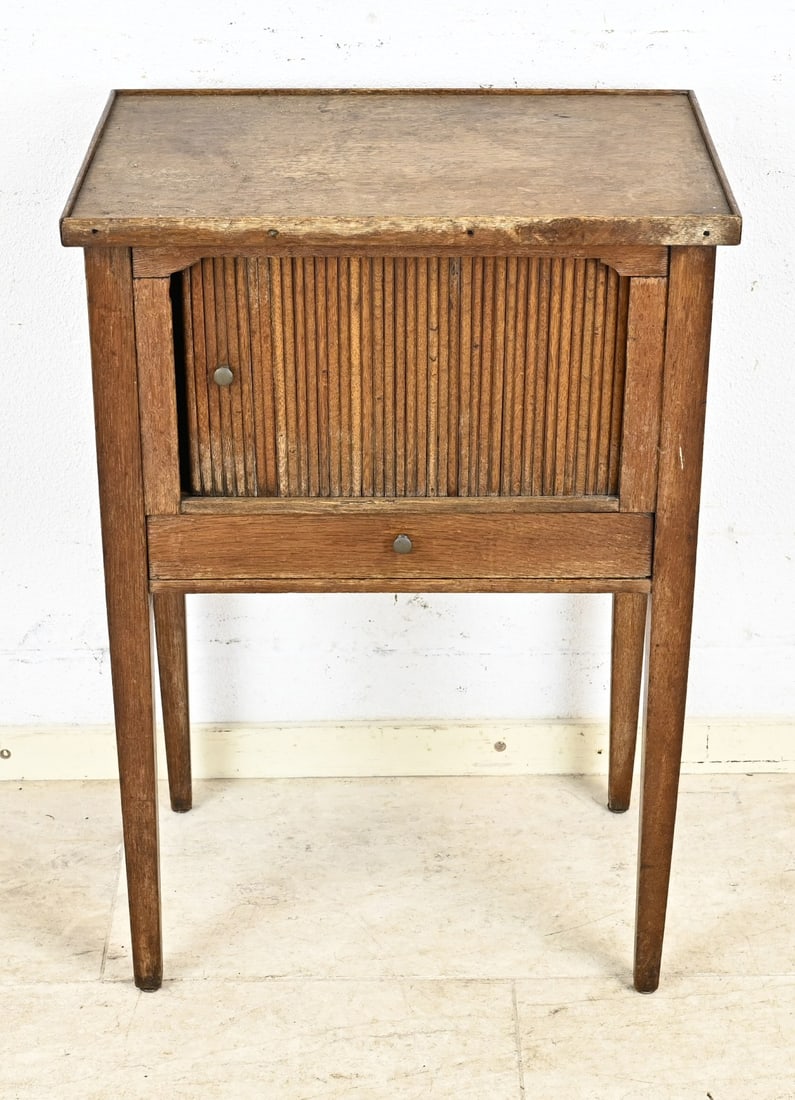 Pots/bedside table: Early 19th century oak pot/bedside table with drawer and roller door. Dimensions: 70 x 50 x 31 cm. In good condition.