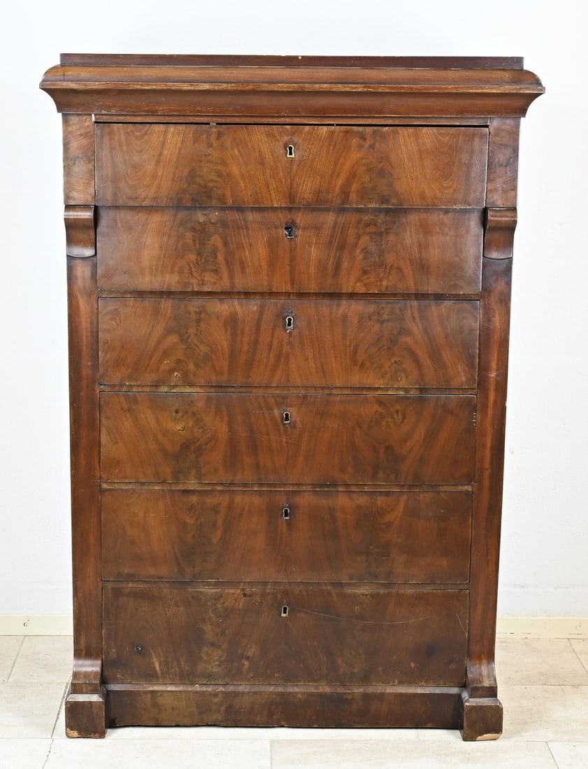 Chiffoniere, 1820: Antique empire mahogany chiffonier with six drawers. Minor damage. Dimensions: 147 x 100 x 48 cm. In fair condition.