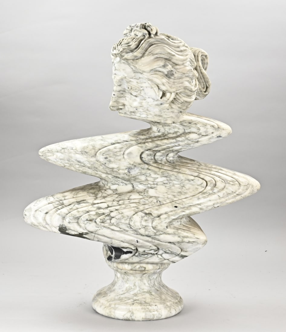 Heavy marble bust, H 69 cm.: Heavy marble, sculpted bust of Greek goddess. Made in zigzag form. 20th century. Dimensions: H 69 cm. In good condition.