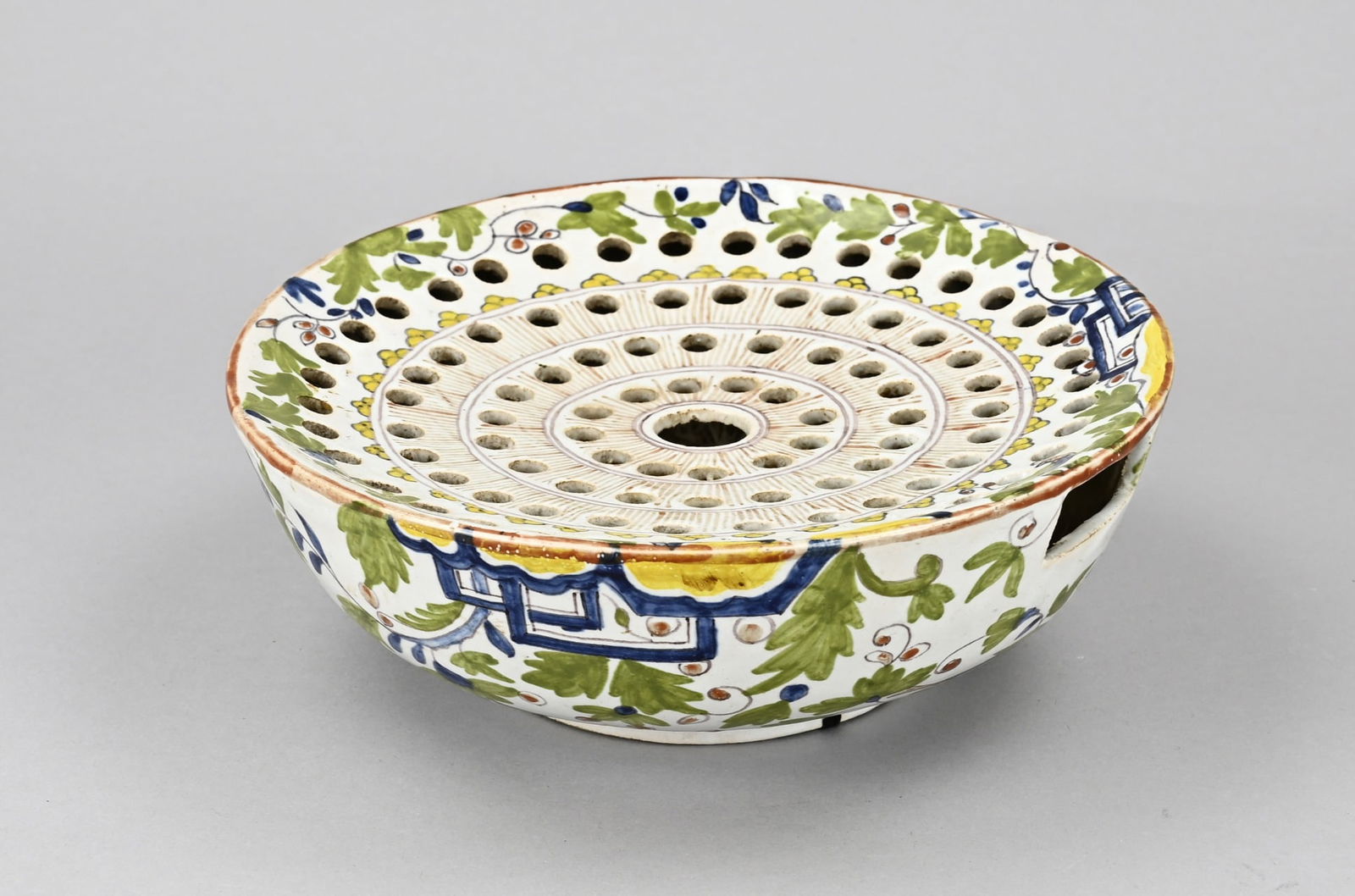 Polychrome Fayence rose bowl (Tichelaar?): Antique Dutch polychrome faience rose bowl. Floral/bird decoration. Tichelaar? Size: 8 - 23,5 cm. In good condition.