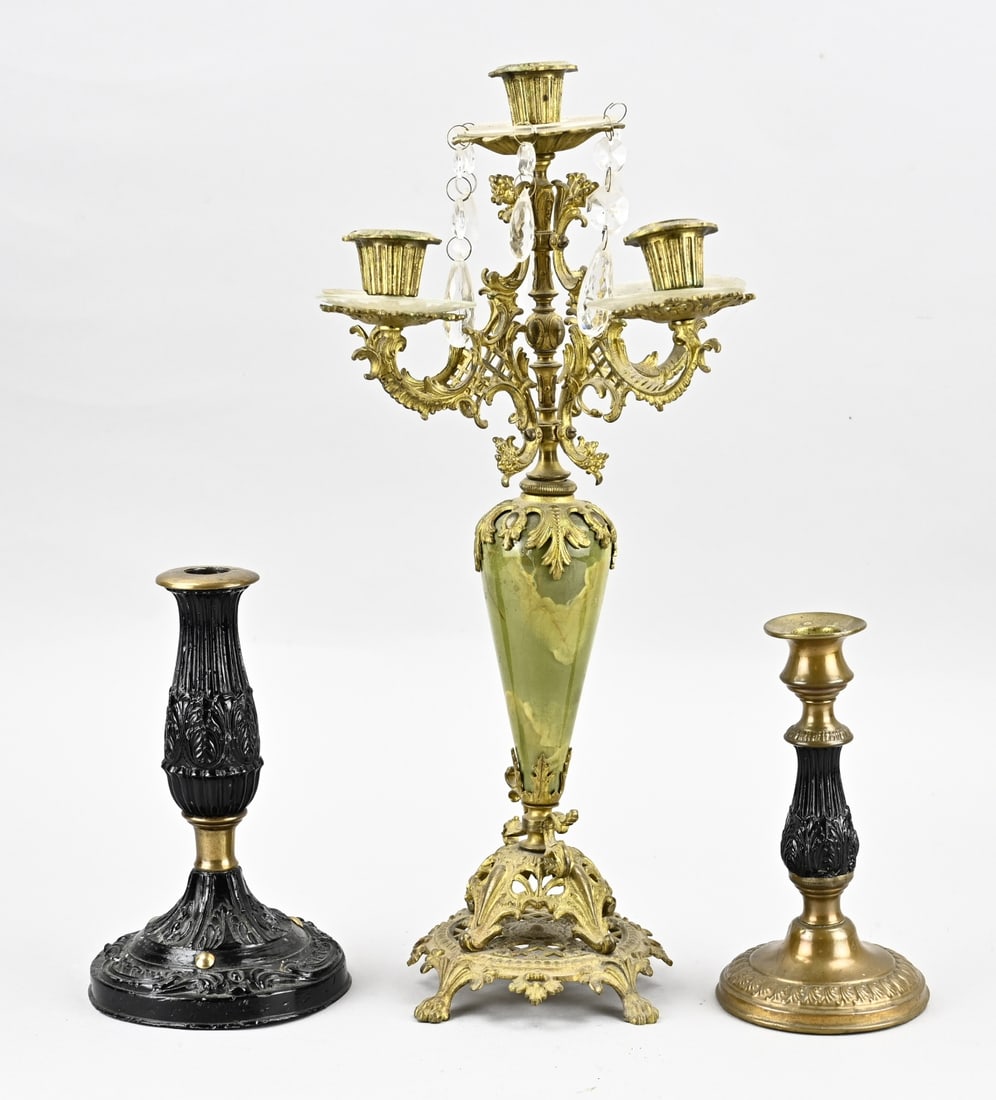 3x Candlestick, H 18.5 - 44.5 cm.: Three various antique candlesticks. Composition metal, brass and onyx. 19th - 20th century. Dimensions: 18.5 - 44.5 cm, In good condition.