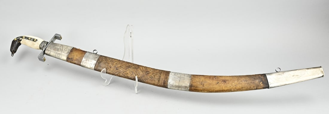 Ottoman sabre, L 97 cm.: 19th Century Ottoman sabre with leather sheath + silver, hilt grip not original. Provided with symbols on blade. Dimensions: L 97 cm. In fair condition.