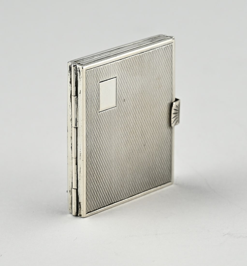 Silver photo frame: Silver photo frame, 835/000, foldable frame with 4 frames. Rectangular model with guilloche decoration on the outside. 5.5x4.5cm., open 5.5x18cm. approx. 82 grams. In good condition.