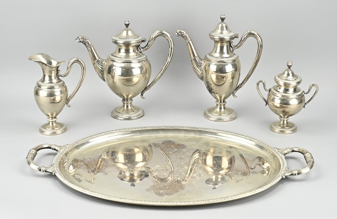 Silver coffee set with plated tray: Silver coffee set, 4 pieces, 800/000, Italy, placed on an oval plated tray. Set with a coffee pot, tea pot, milk jug and a sugar bowl, all around a round foot, curled handles with acanthus leaves and