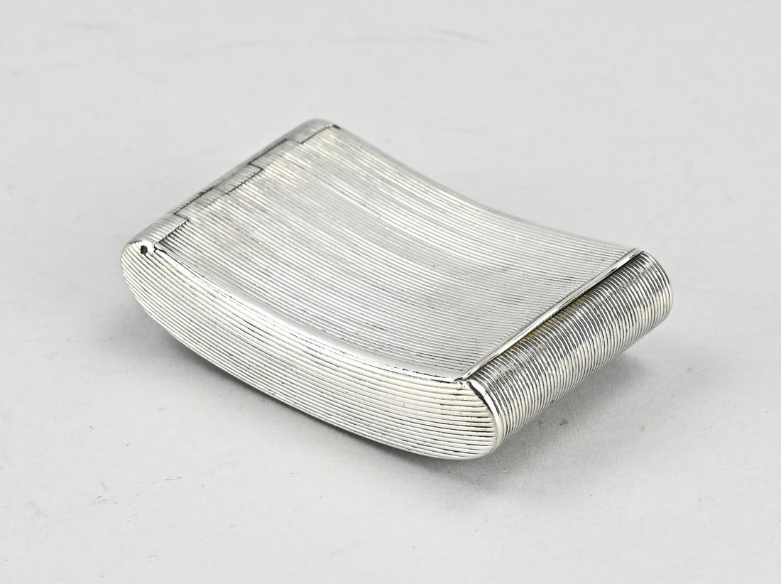 Silver box: Silver box, 833/000, rectangular hip model with rib decoration, 7.5x1.6x5cm. MT.: H.Kuijlenburg, Schoonhoven, jl.:T:1828. approx. 70 grams. Provided with a gilded interior with engraving: March 20,
