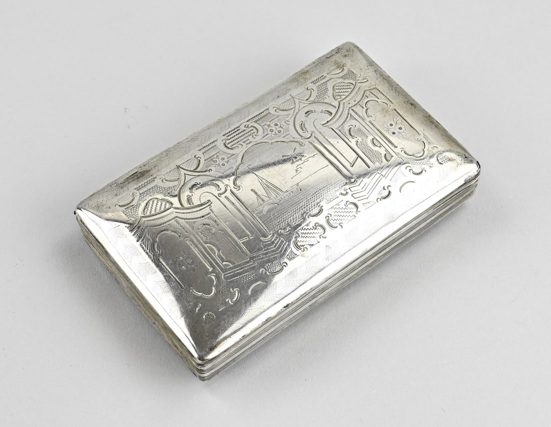 Silver tobacco box: Silver tobacco box, 833/000, rectangular model with a hinged lid with an engraved decoration of a boat and a mill. With line decoration on the side and bottom. MT.: C.van Dam Kooijman, Schoonhoven,