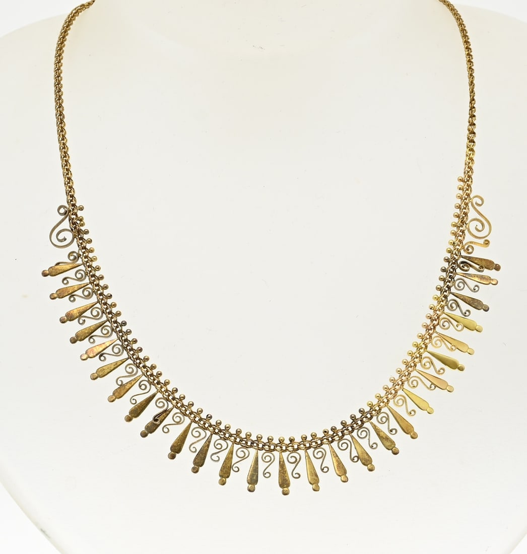 Golden filigree necklace: Yellow gold choker, 585/000, with bars and filigree work. Length 43 cm. approx. 9.3 grams. Width 3-13 mm. In good condition.