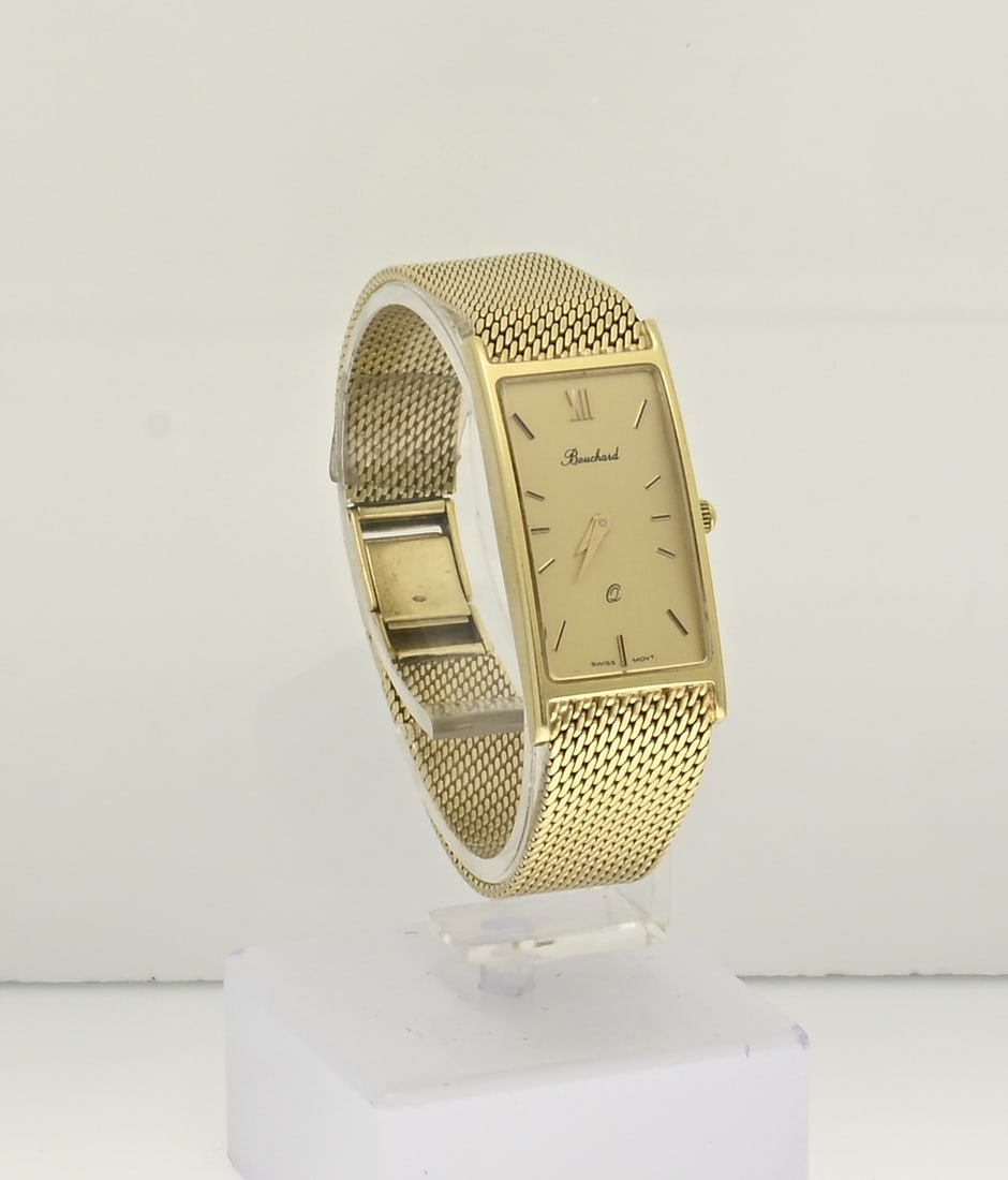 Gold watch Bouchard: Yellow gold ladies watch, 585/000, Bouchard, with a rectangular case attached to a Milanese braided strap. Quartz. no.: 231 Length 17 cm. Case width 16.5 mm. Gross weight approx. 36.4 grams. In very