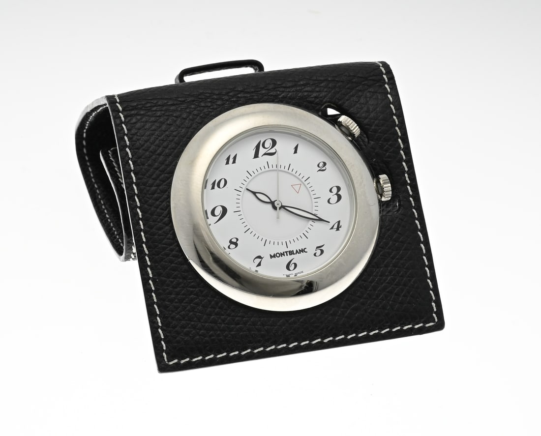 Mont Blanc travel alarm clock: Travel clock Mont Blanc, steel clock in a black leather case. Quartz. 6x6cm. 7056. AL2127443. In good condition, needs new battery.