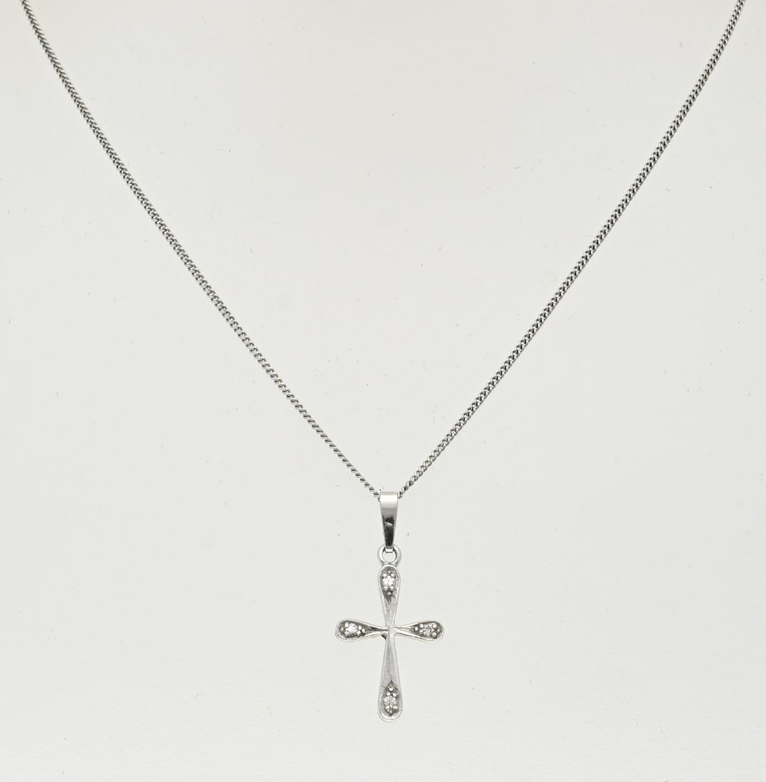 White gold necklace and pendant with cross: White gold necklace with a pendant, 585/000, in the shape of a cross. Fine gourmet necklace with a cross-shaped pendant with 4 small diamonds in the corners. Length 40 cm. Size 25x10 mm. Including