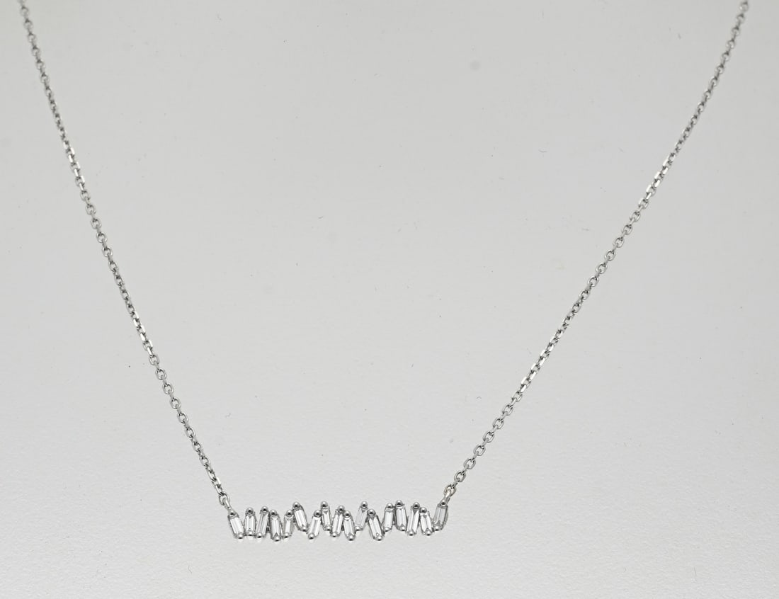 Suzanne Kalan white gold choker: Elegant white gold choker, 750/000, with diamonds. Fine anchor necklace with a bar in the middle with 17 baguette cut diamonds, zigzag placed next to each other. Marked: Suzanne Kalan, USA. Length 46