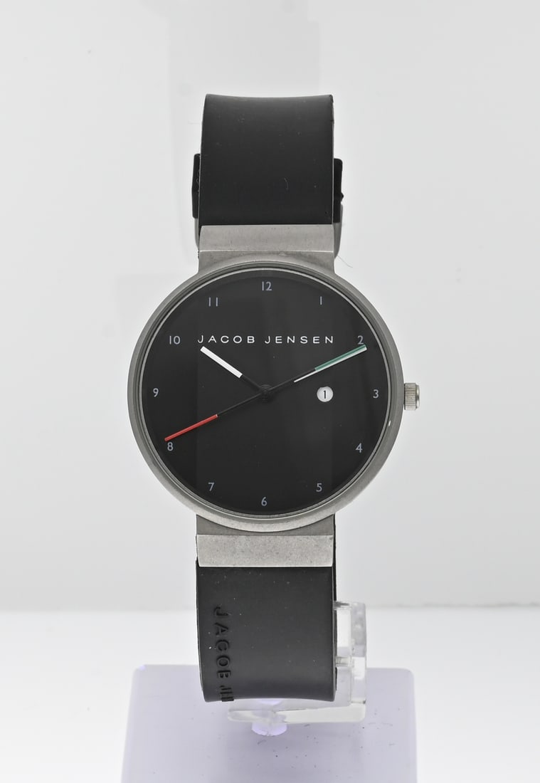 Jacob Jensen watch: Jacob Jensen watch, by Max Rene, titanium, unisex, with a round case with date display, ø case 34 mm. With an original black strap. Quartz. Working in good condition.