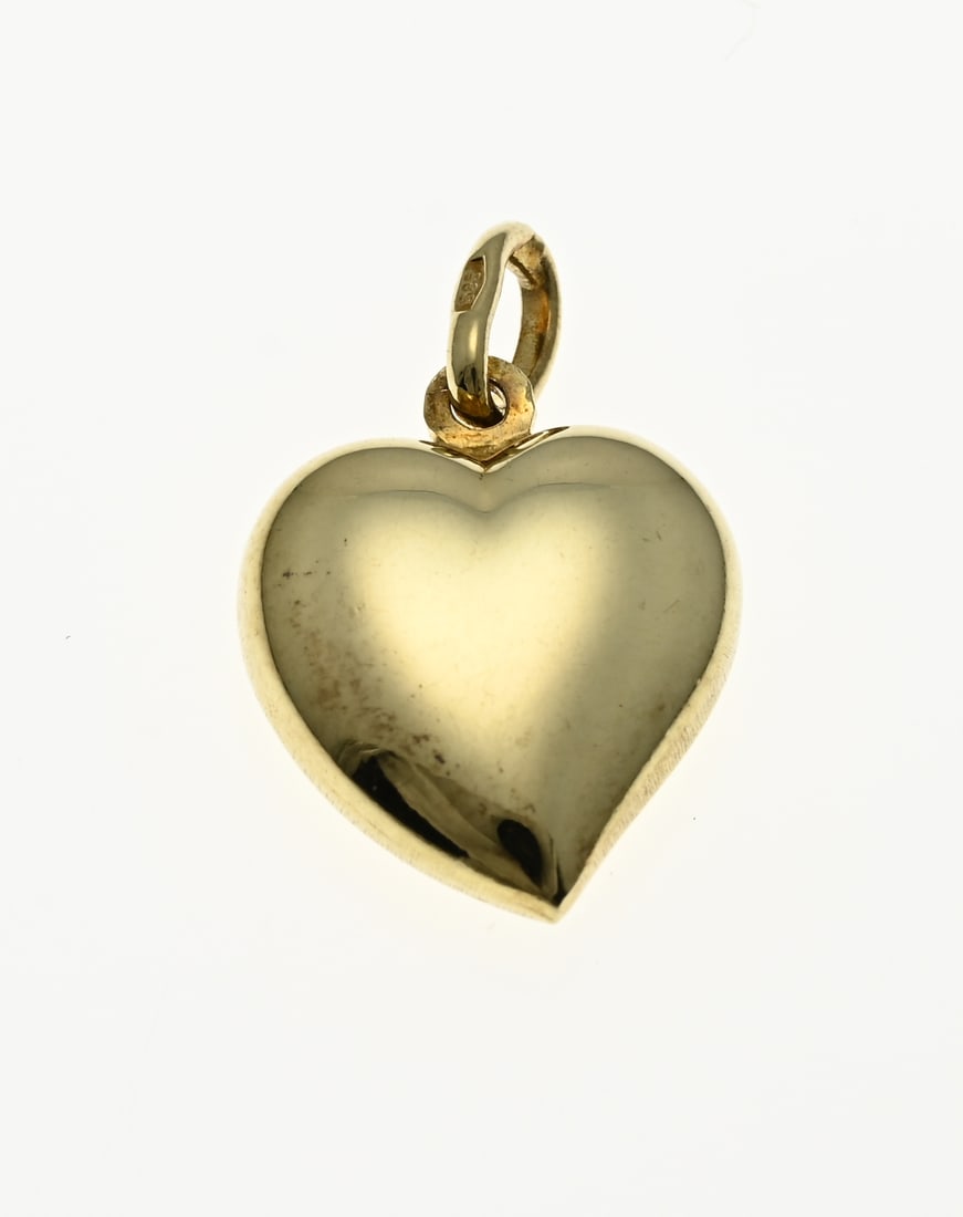Golden heart pendant: Yellow gold pendant, 585/000, in the shape of a heart, 15x22mm. approx. 1.6 grams. In good condition.