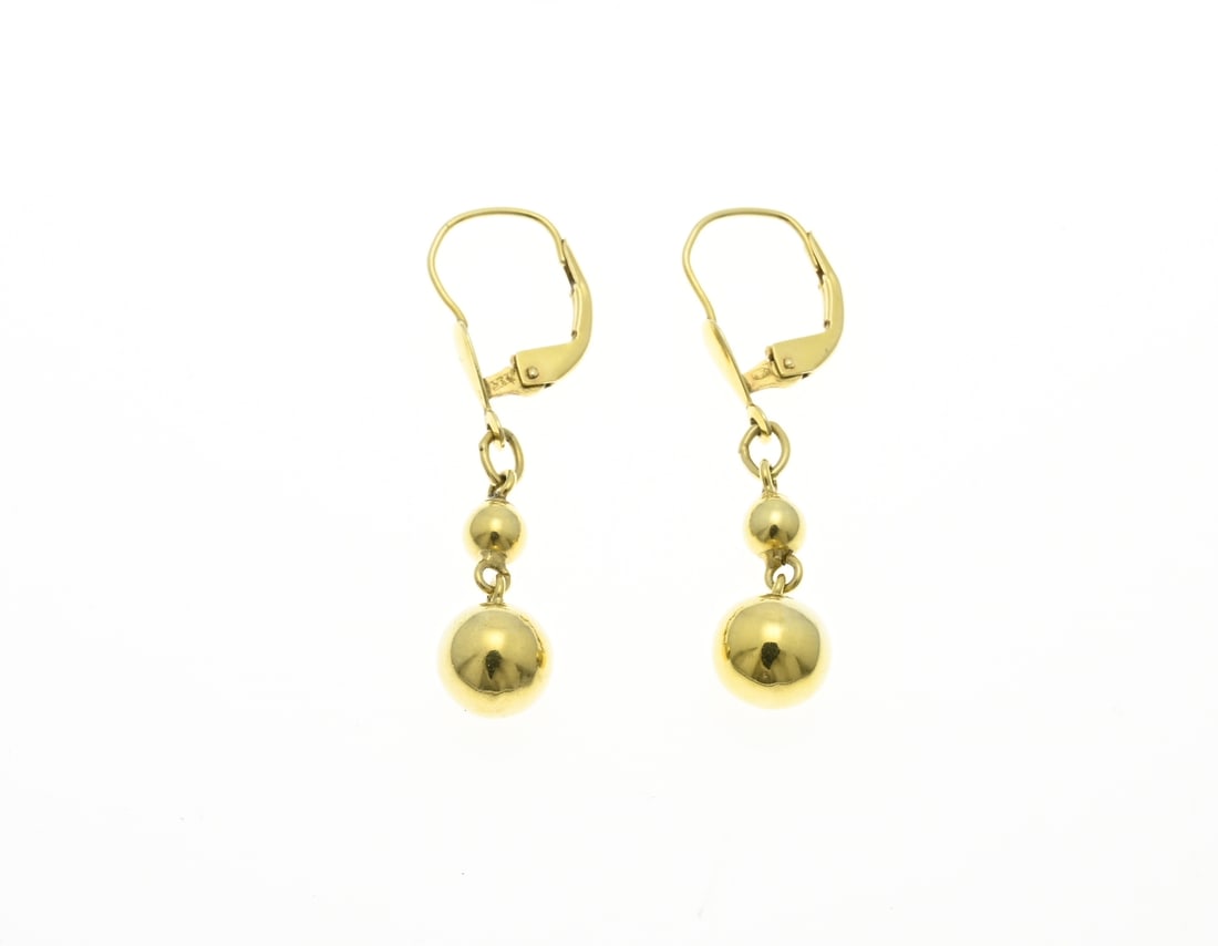 Gold earrings with balls: Yellow gold earrings, 585/000, with balls. Brisures with 2 balls, ø4-7.4 mm. Length 4 cm. approx. 2.3 grams. In good condition.
