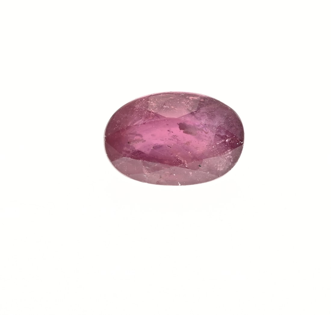 Cut ruby: Oval faceted ruby. 1.85 ct. 8.4x5.6mm.