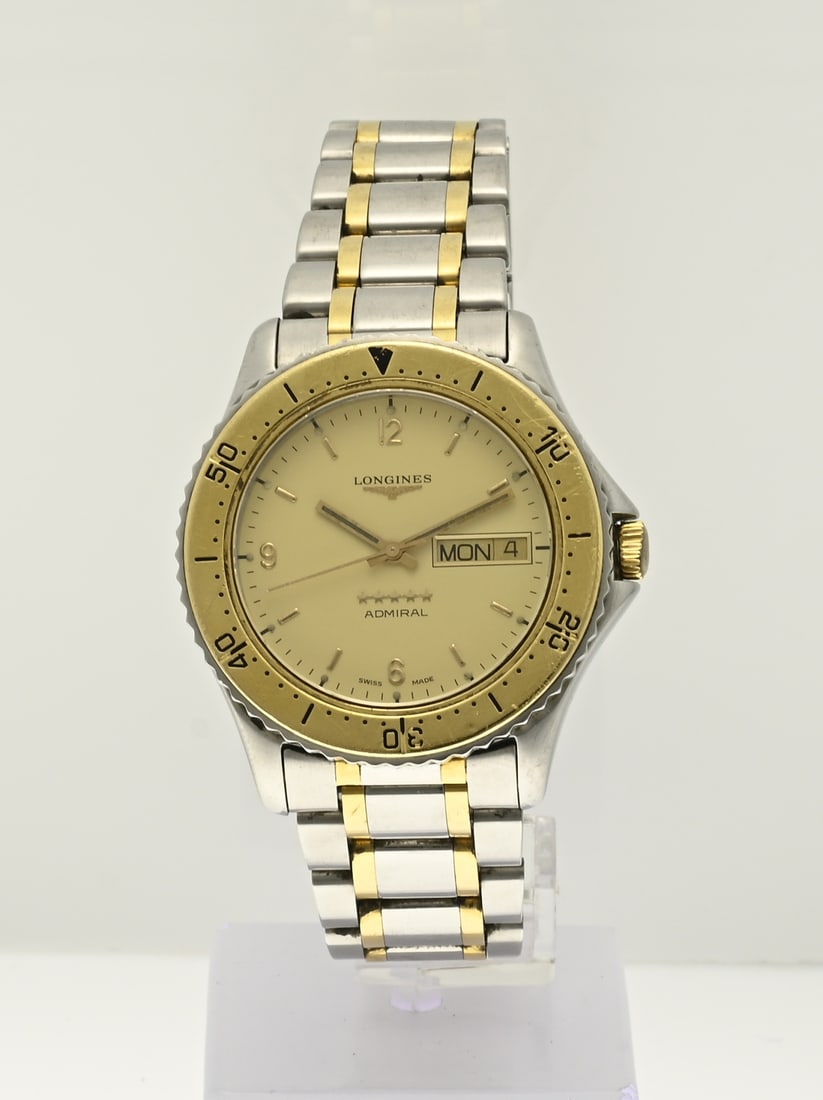 Longiness watch: Longiness watch, admiral, automatic, bicolour, with a gold-coloured bezel and yellow dial with day and date display. Equipped with a steel link strap with gold-plated details. ref. no.: 26719136.