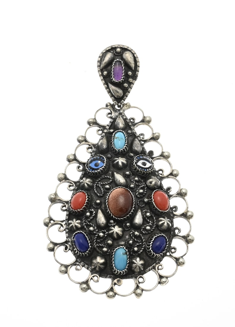 Large silver pendant with coral, lapis, turquoise: Large silver pendant, 800/000, pear-shaped set with turquoise, coral, lapis lazuli, goldstone and amethyst. 10x5.5cm. approx. 30.5 grams. In good condition