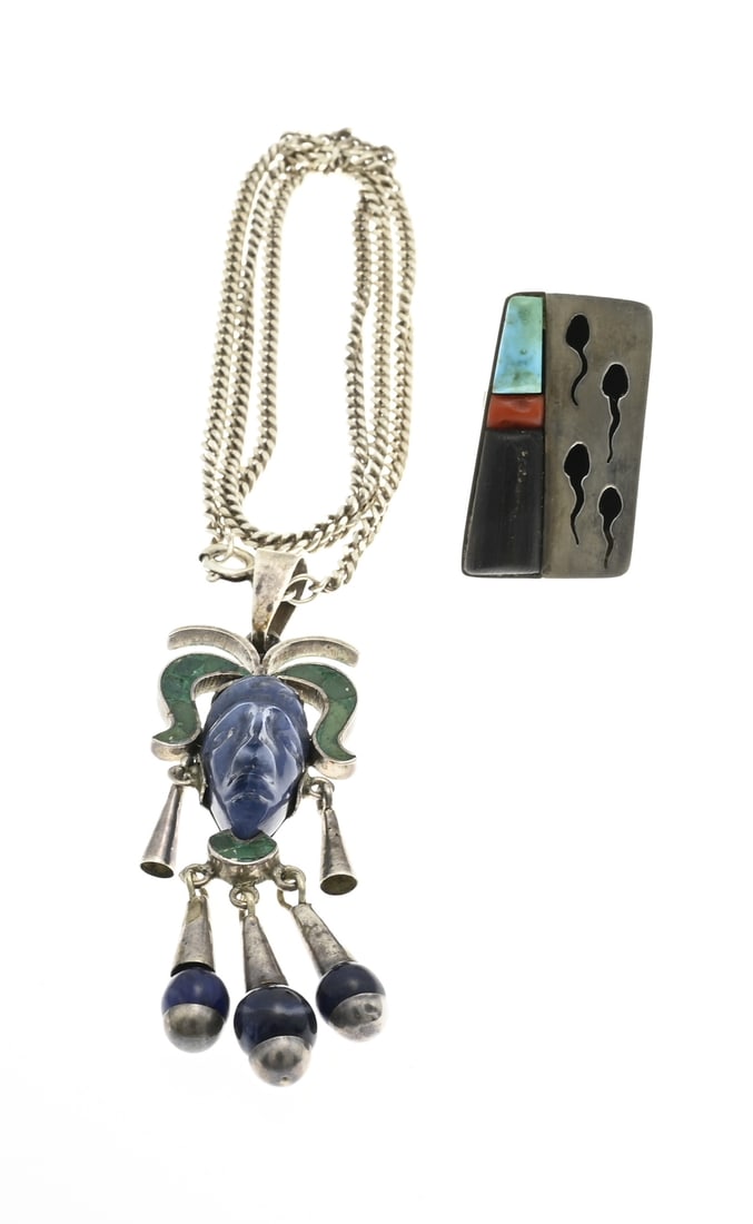 Silver necklace, pendant and ring with lapis and turquoise: Set of silver jewelry, 925/000, Mexico, with gemstones. A necklace with a pendant with a figure with lapis lazuli and malachite. Pendant size 7x2cm. And a ring with trapezium shaped head with sawn