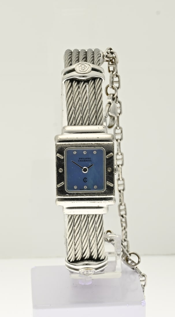 Phillippe Charriol silver watch: Silver ladies watch, Phillippe Charriol, 925/000, with a rectangular case with a blue mother-of-pearl dial with diamonds. Equipped with a clamp strap 6007909. Case width 19 mm.