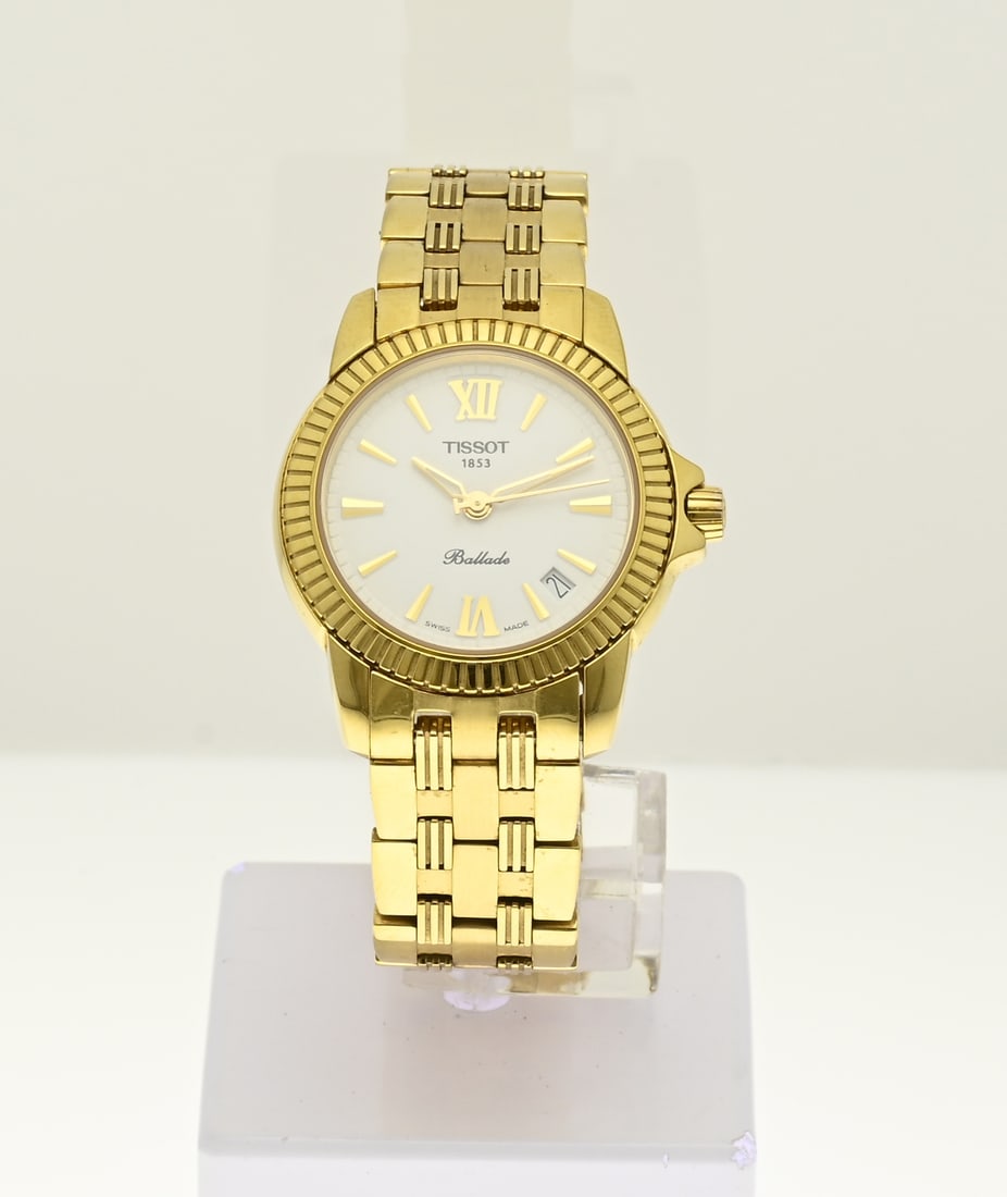 Tissot watch: Tissot Ballade ladies watch, gold plated model with a link strap with butterfly clasp. Quartz. Equipped with a white dial with date display. The watch has a sapphire glass. C427/527. In good