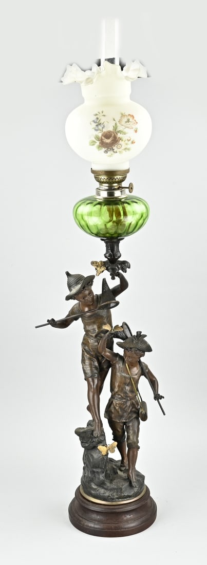 Rare kerosene lamp, H 104 cm.: Antique rare French composition metal kerosene lamp with butterfly-catching youths. Polychromy. Circa 1900. Dimensions: H 104 cm. In good condition.