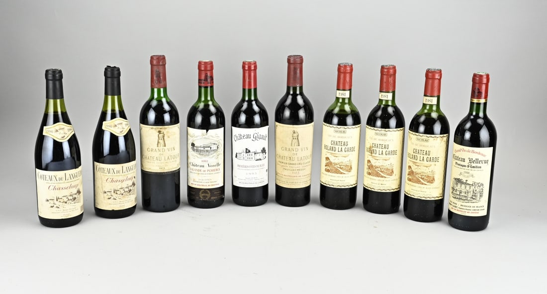 10 bottles of red wine: Lot with ten bottles of red wine. Among other things; 1x Chateau Voselle Le lande de pomerol 1982. 1x Chateau Bellevue 1988. 3x Vine de Bordeau chateau Roland la garde 1981. 2x Coteaux du Languedoc
