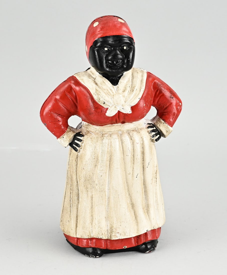 Diecast money box: Diecast money box, after antique example. Dimensions: 29 cm. In good condition.