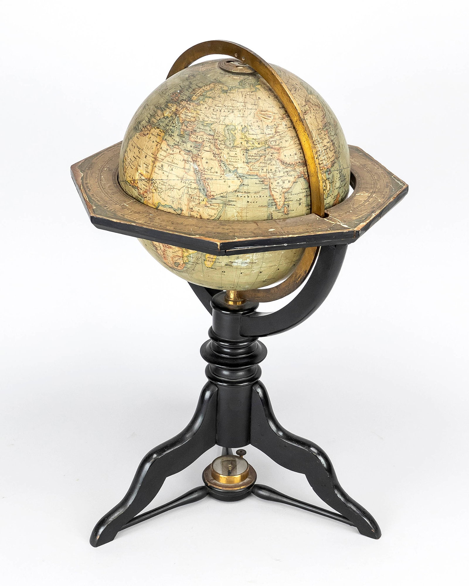 German globe, 1880: Antique German globe with compass by H. Kiepert Berlin. With ebonised wooden base. Circa 1880. Dimensions: H 47 cm. In good condition.