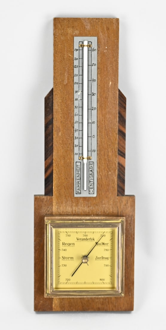 Barometer: Dutch barometer of oak + coromandel wood, Amsterdam School. Circa 1930. Dimensions: L 46 cm. In good condition.