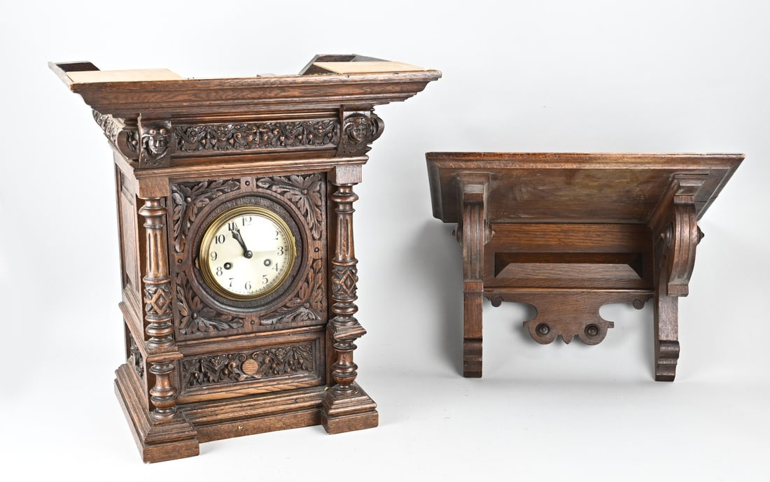 Table clock + console: Antique German oak Gründerzeit table clock with console. Circa 1900. Numbered movement. Weekly runner, half-hour strike. Clock size: 52 cm. Console size: 32 cm. In good condition.
