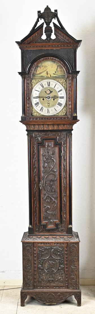 Frisian grandfather clock, H 235 cm.: Frisian Louis Seize grandfather clock with carving. Circa 1800. FJ Nauta Leeuwarden. Eight-day movement, quarter striking, alarm, month, day and date indication + moon phase. Dimensions: 235 x 48 x