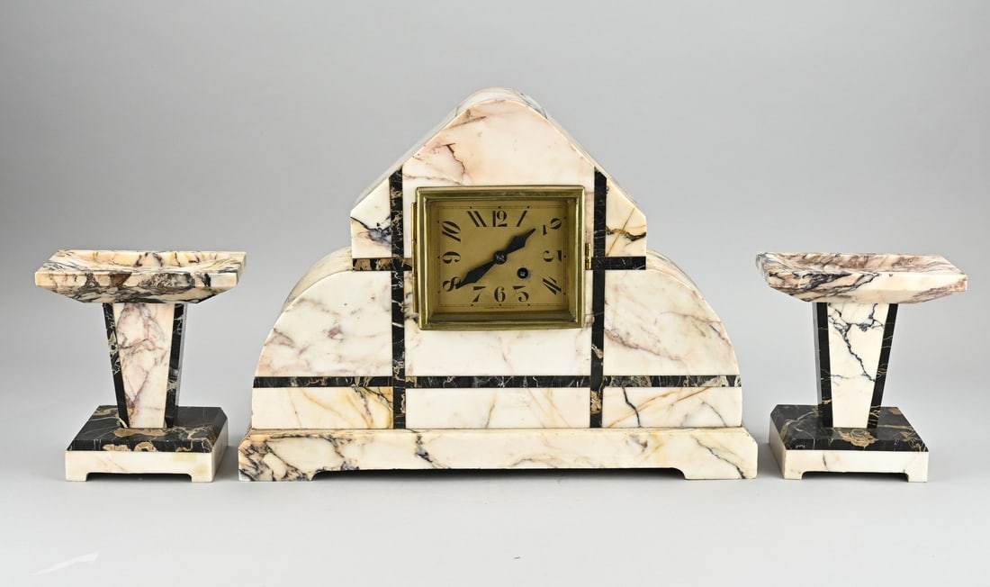 Marble clock set, 1920: Antique marble art deco clock set. France. Circa 1920. Eight-day movement, half-hourly striking, spring pendulum. Dimensions: 30 x 44 x 14 cm. In good condition.