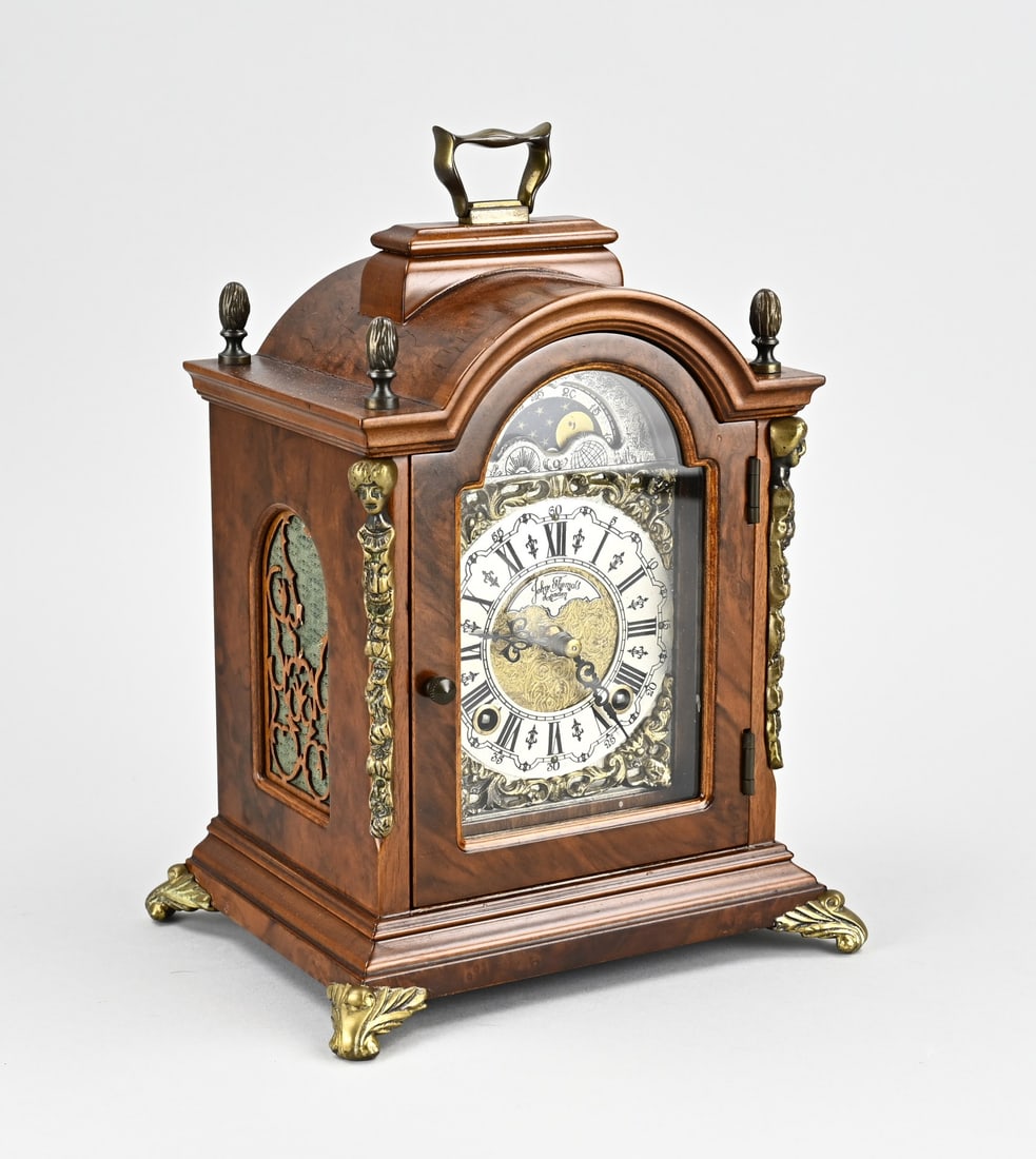 Warmink table clock: Walnut Warmink table clock with bronze decorations, moon phase + repetition striking mechanism. Dimensions: H 27 cm. In good condition.