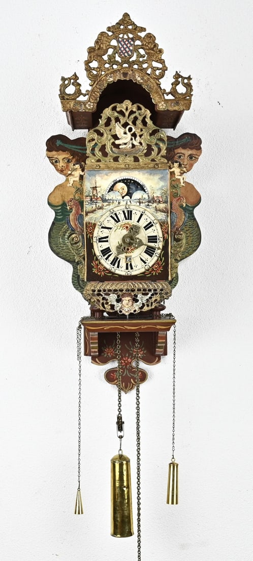 Frisian chair clock: Old hand-painted Frisian chair clock with alarm. Second half of the 20th century. Size: 83 cm. In good condition.
