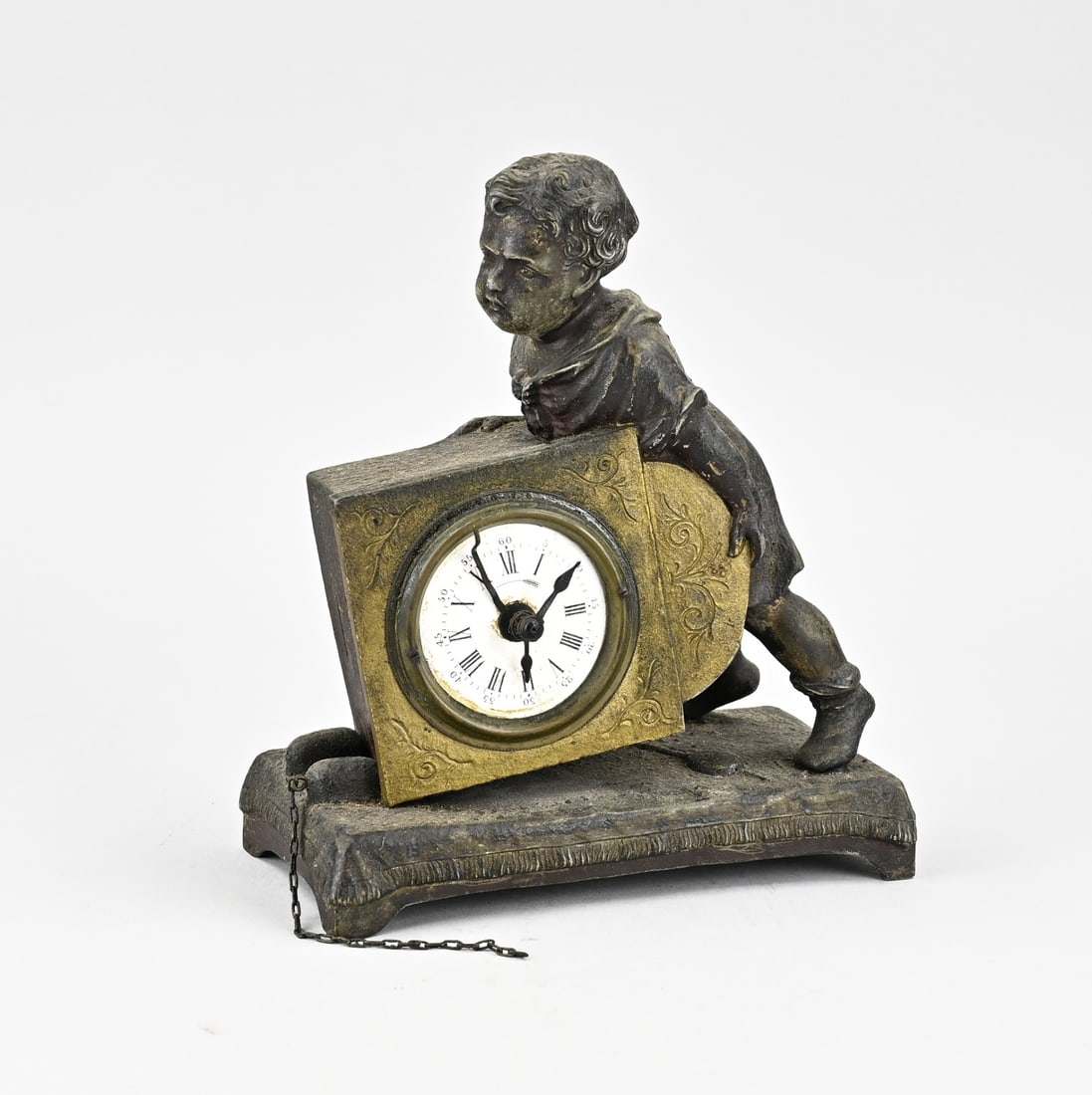 French alarm clock, 1890: Antique French alarm clock. Circa 1890. Child trying to carry clock. Composition metal. Not tested. Dimensions: 22 x 18 x 9 cm. In good condition.