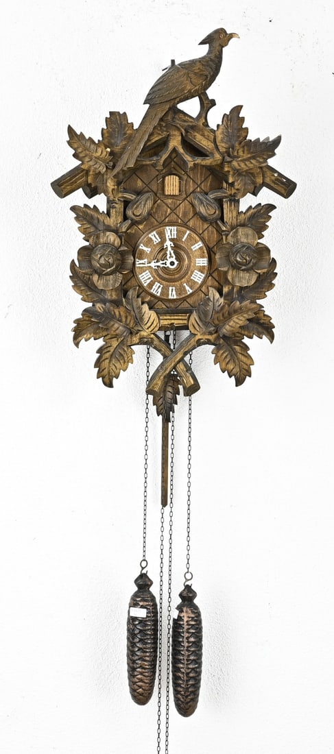 Black Forest cuckoo clock: Old German woodcarved Black Forest cuckoo clock. Mechanical. Second half 20th century. Size: 50 cm. In good condition.