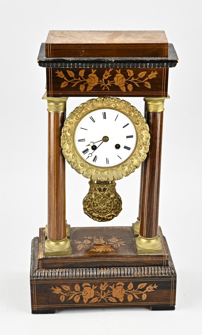 French portal clock, 1860: Antique French Louis Philippe portal clock with intarsia. Circa 1860. Eight-day movement, half-hourly striking. Dimensions: H 46 cm. In reasonable condition.