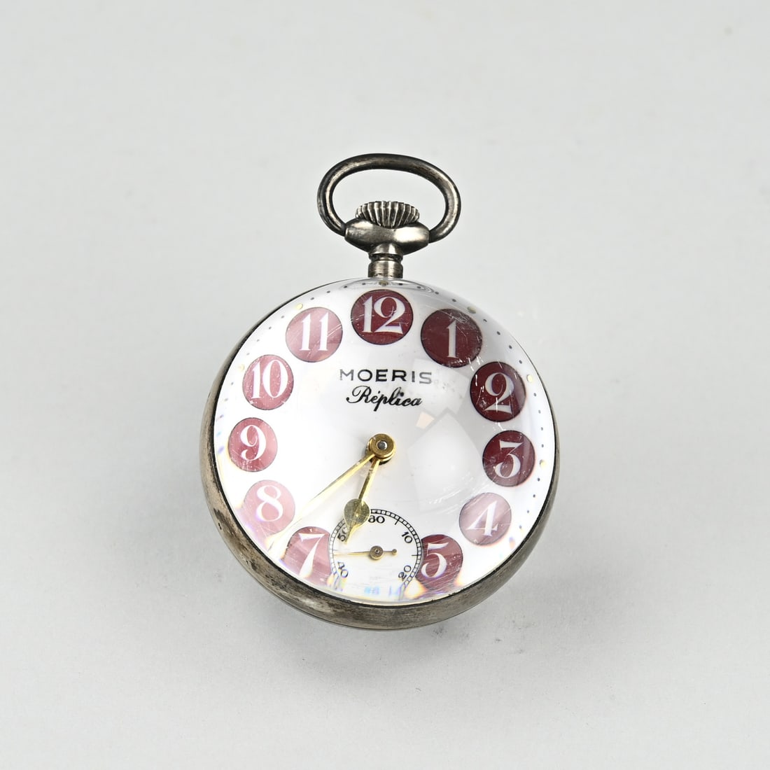 Silver watch (Moeris): Table watch, clock, marked Moeris Replica, mechanical, spherical model with a decentralized second hand. The watch has a silver edge, 925/000. 8x6cm. Working. In good condition.