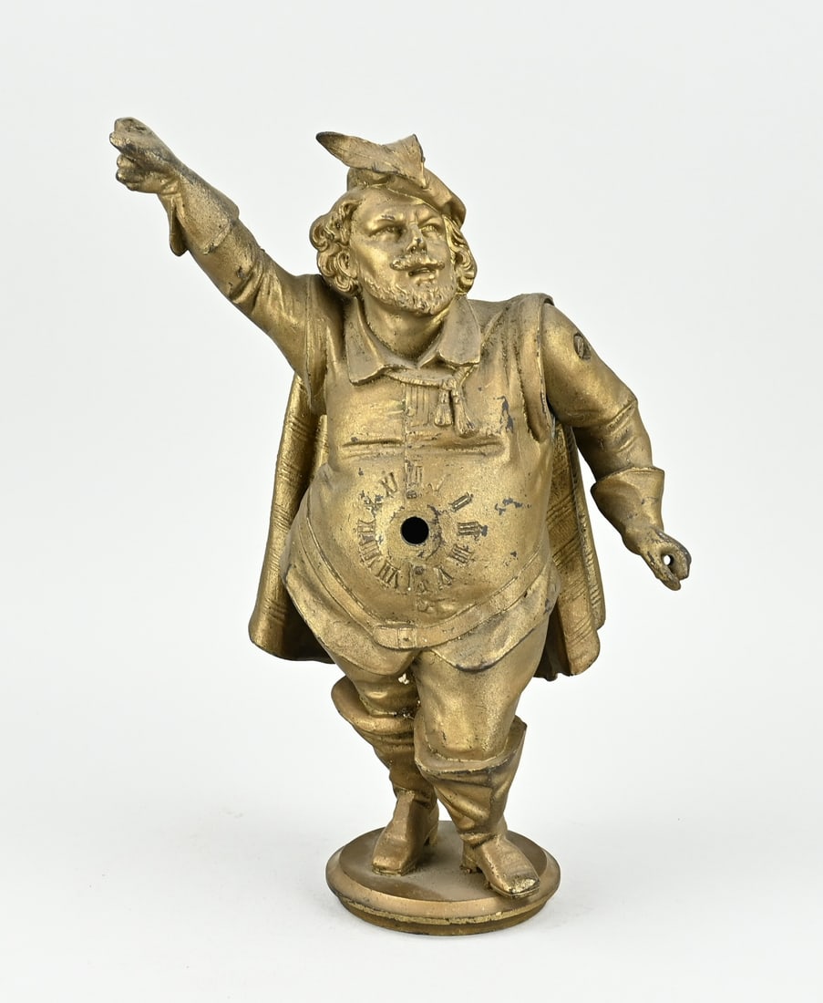 Diecast clock case (without clockwork): Antique Diecast clock case without clockwork. Movable arm. Circa 1900. Size: 29 cm. In good condition.