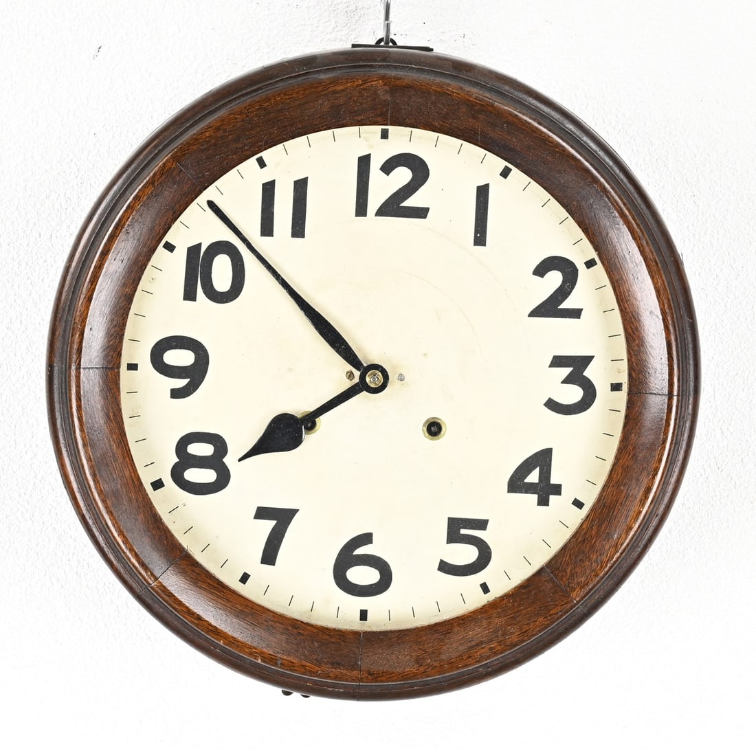 School clock, 1900: Antique German school clock with half-hourly striking. Dimensions: Ø 38 cm. In good condition.
