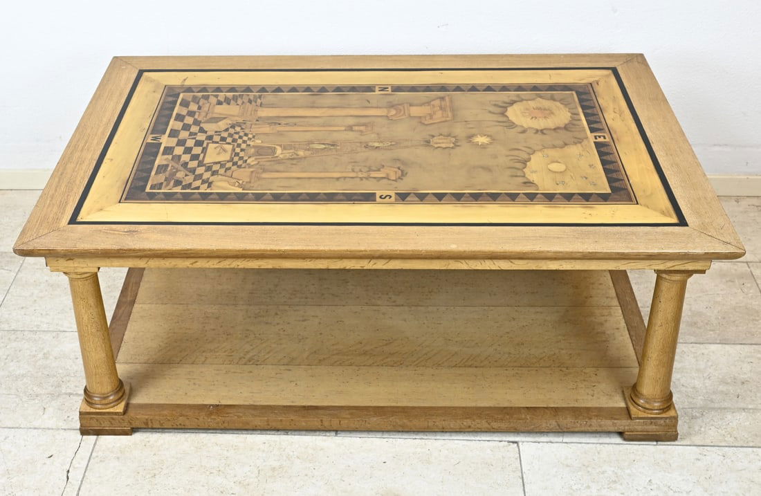 Antique Freemason coffee table, 1900: Antique Freemason coffee table with intarsia (temple of Solomon) on top with Freemason symbols + cardinal directions. Dimensions: 45 x 120 x 79 cm. In good condition.