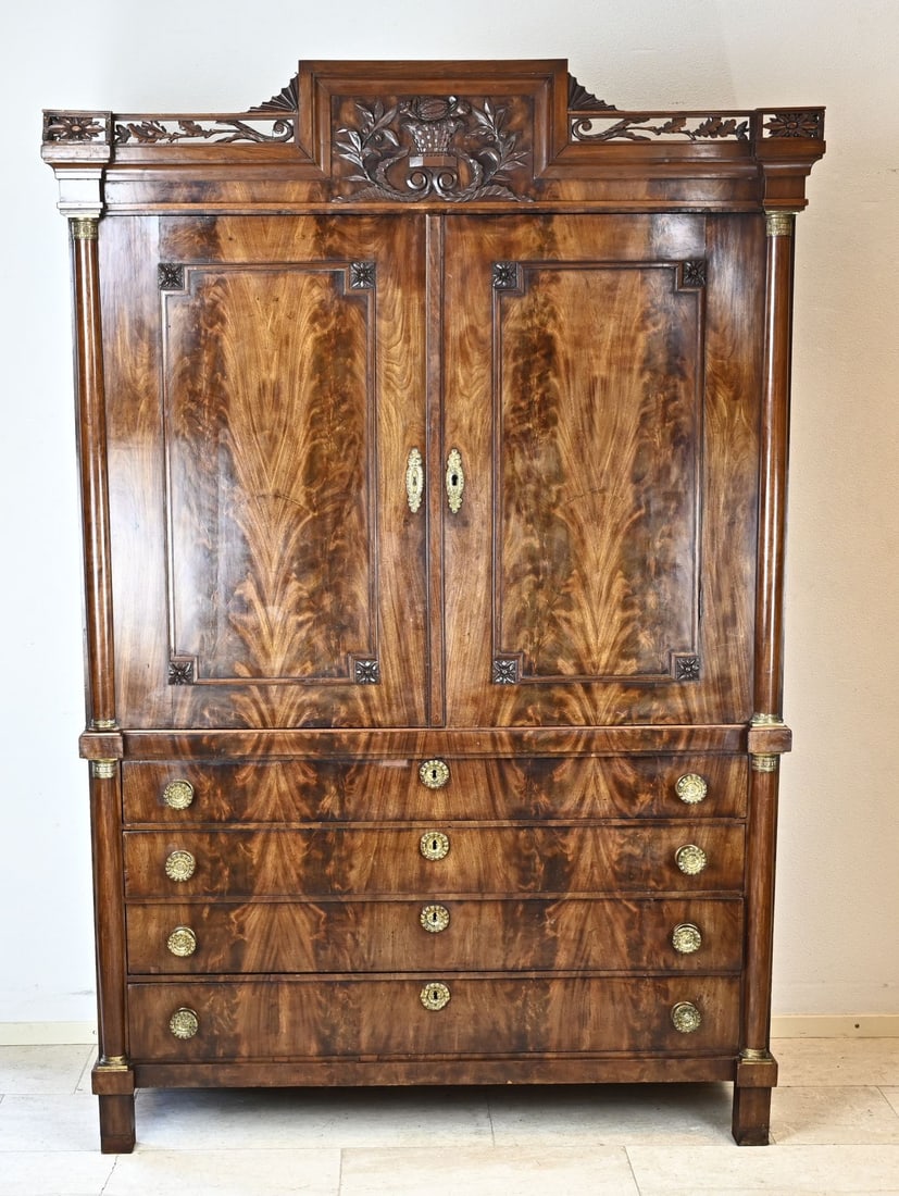 Mahogany cabinet, 1800: Dutch mahogany Louis Seize cabinet with half columns, beautiful carving and original fittings. Circa 1800. Dimensions: 225 x 150 x 52 cm. In good condition.