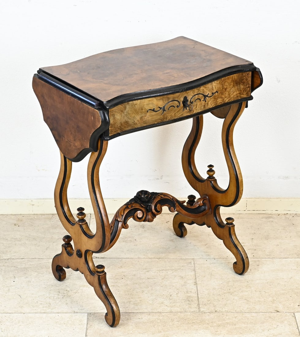 Cheeks table, 1860: Walnut Willem III sewing/cheeks table with beautifully crafted foot with flower shape. Circa 1860. Interior is completely finished with maple veneer. Dimensions: 71 x 55 x 39 cm. Dimensions