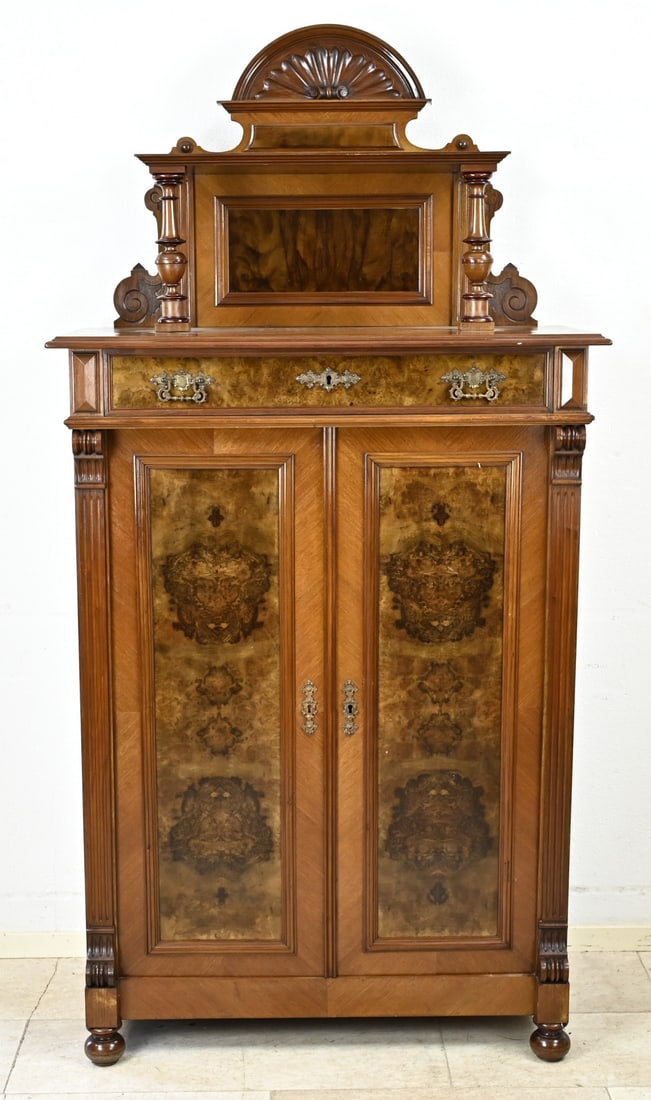 Walnut vertico, 1880: Antique walnut Gründerzeit vertico with upstand. Germany. Circa 1880. Dimensions: 186 x 95 x 47 cm. In very good condition.