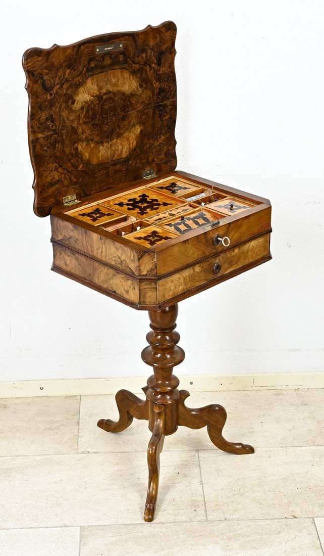 Sewing table, 1860: Beautifully polished burl walnut Louis Philippe sewing table. Germany. Circa 1860. Dimensions: 79 x 48 x 49 cm. In very good condition.