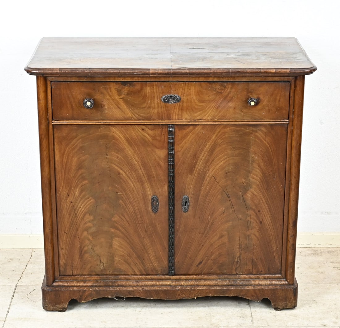 Mahogany trestle cabinet, 1820: Dutch mahogany empire penant cabinet. Circa 1820. Unrestored. Dimensions: 84 x 88 x 49 cm. In fair/good condition.