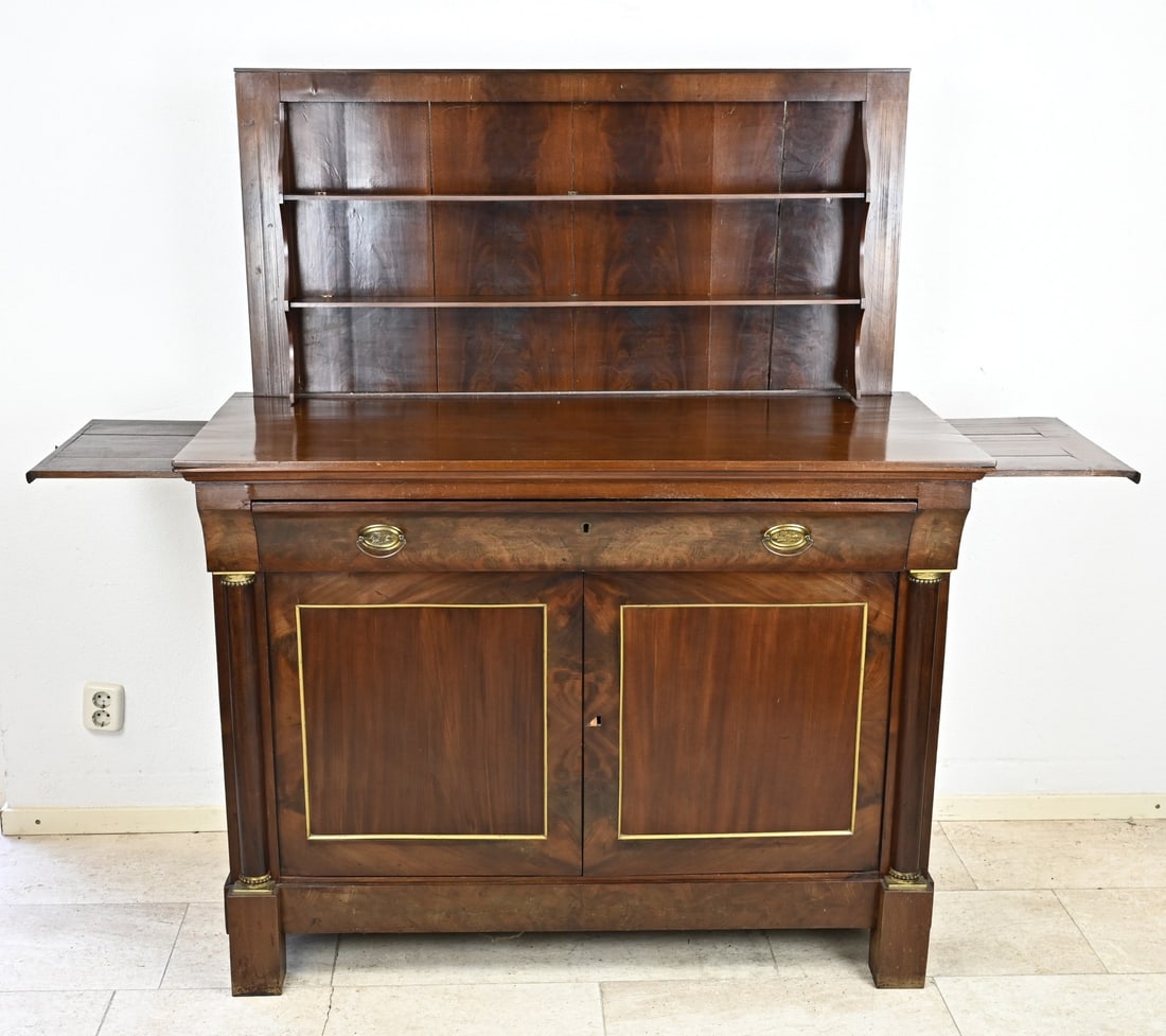 Mahogany Empire folding buffet, 1820: Dutch mahogany empire folding buffet with half columns and capitals. Circa 1820. Dimensions: 100 x 130 x 57 cm. In reasonable/good condition.