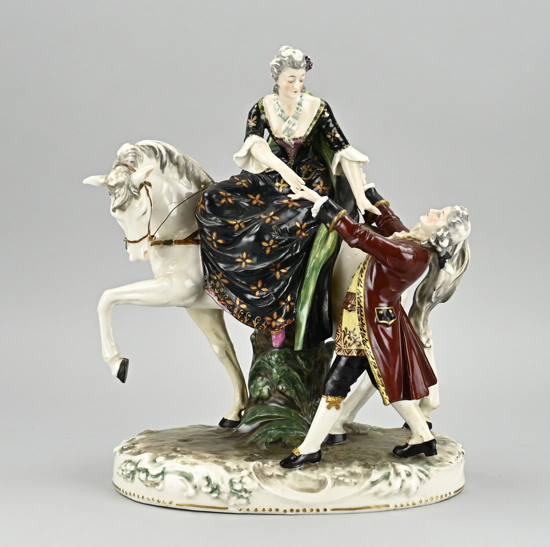 Image, Nobleman with lady on horse: Old porcelain group of figures. Marked F with crown. 20th century. Thuringia? Dimensions: 23 x 26 x 15 cm. In good condition.