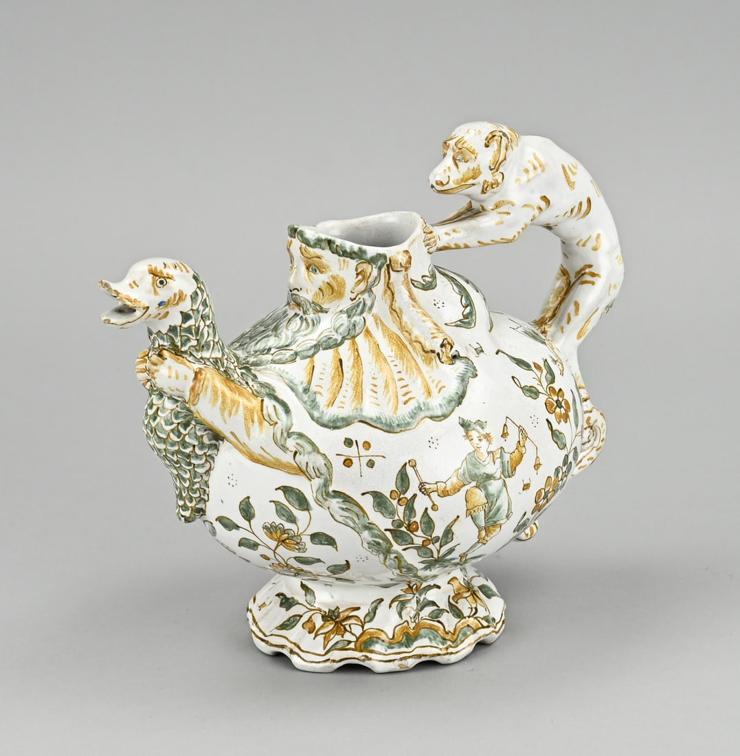 Antique pouring jug: 19th Century French polychrome faience jug with monkey + bottom mark FS Dimensions: 17 x 20 x 11 cm. In good condition.